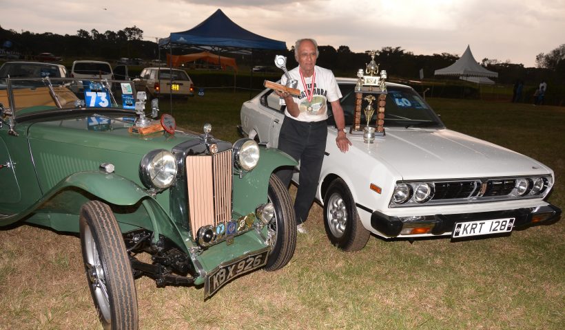Sati Gata-Aura with his two car that won podium places at this year's Concours d'Elegance. The 1977 Nissan 160J (right) was the overall winner while the 1947 MG TC (left) came second.